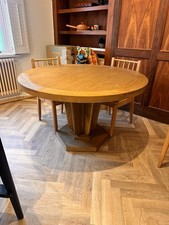 Oka solid oak round pedestal dining table.