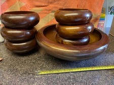 Six dark probably teak wood