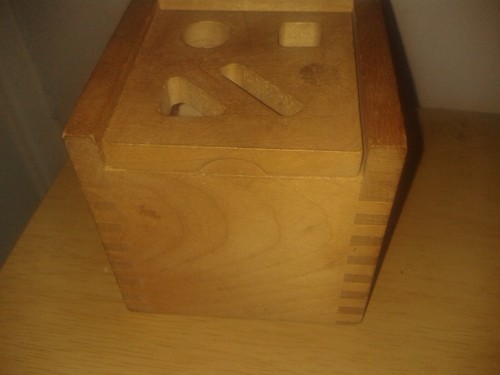 Vintage wooden shapes cube