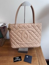 CHANEL Beige Medallion