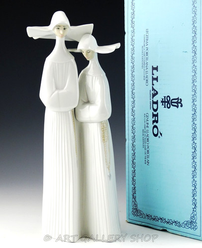 Lladro figurine tall - 13", two