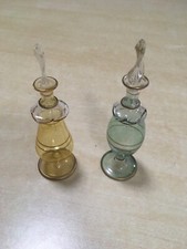 Two Egyptian glass perfume bottles - gold trim - with stoppers