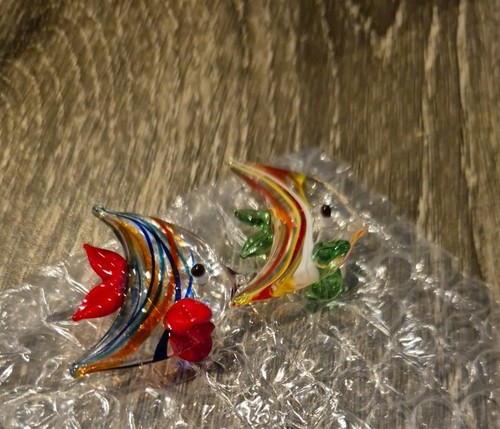 Two very small glass fish - very,