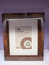 Pair of two wooden effect photo frames un opened