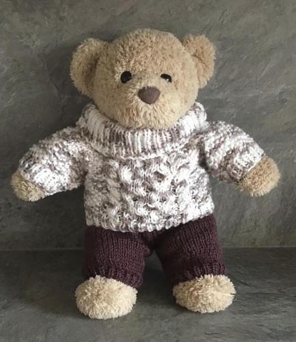 Hand knitted teddy bear - hand,