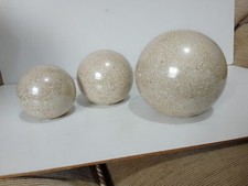 Carpet balls, three ceramic