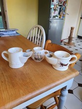 Three vintage shaving mugs dating from the 1950s owards.