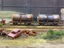 OO gauge wagons: Abandoned Esso Oil Tankers, heavily rusted. Ref N4