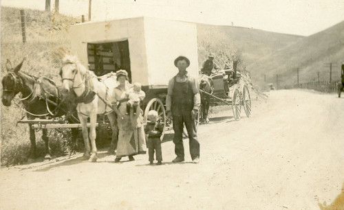 Horse drawn wagon man - drawn,