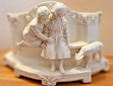 A Pair of Bisque flower vases