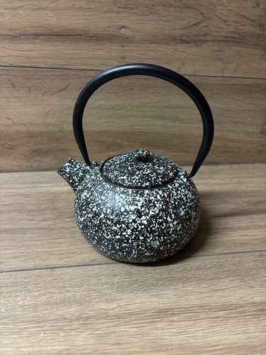 Small black speckled cast - speckled,