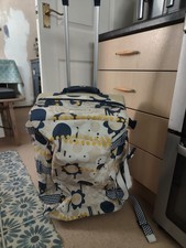 Roxy Quiksilver Suitcase with Handle and Wheels. Very Good Condition