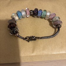 Troll Bead Bracelet With 14 Glitter Beads. Everything in the photo is included 