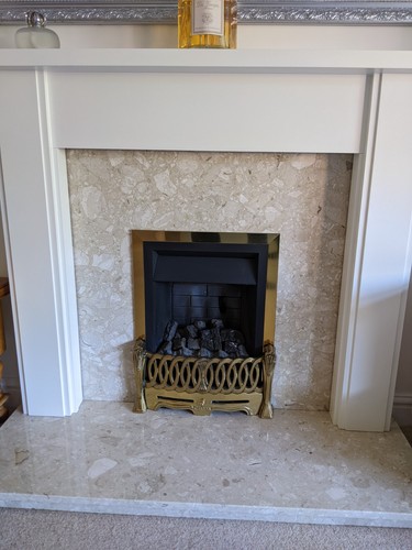 White fire surround with - fire,