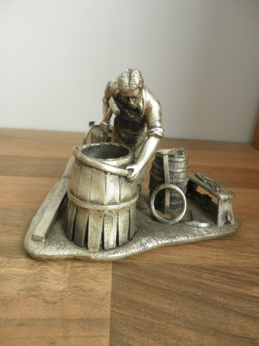 Pewter cooper sculpture by - ,