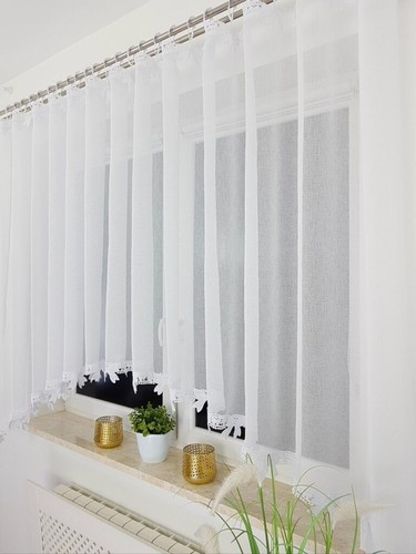 White voile curtain with - with, bow