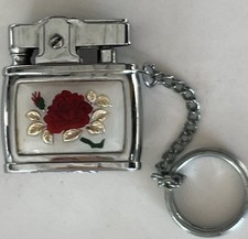 Vintage Penguin Rose Lighter