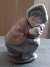 NAO,GIRL ASLEEP OVER HER