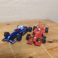 Vintage Scalextric 1:32 Cars Minolta F1 C2676 and Team Bridgestone C2095