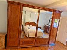 Large mirrored double wardrobe with four drawers in good condition