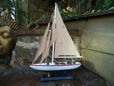 Model Yacht On Stand With Red