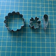 3 random metal flower cutters 