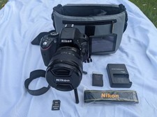 Nikon D5100 with lens, SD