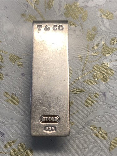 Tiffany silver money - co, clip