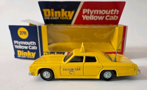 Dinky toys plymouth yellow cab - toys,
