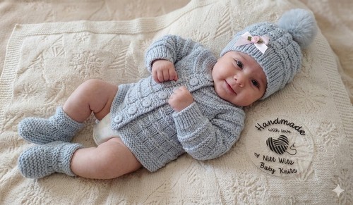 Hand knitted grey baby - hand,