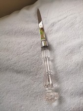 Letter opener , cut glass and silver plated blade .