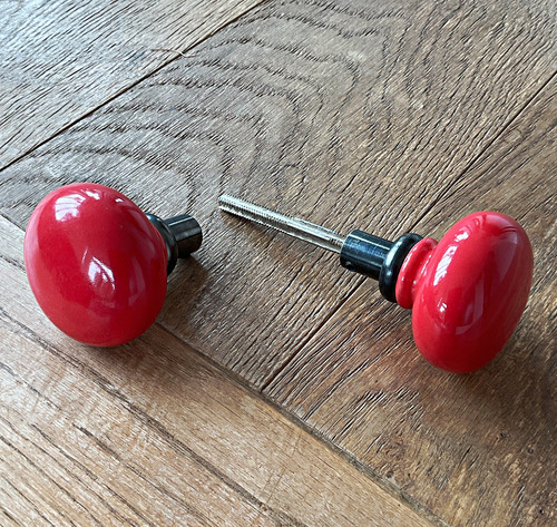 Pair red ceramic door knobs - red,