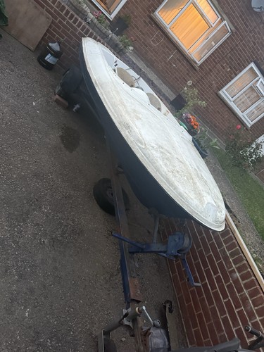 Small boat and trailer - small,