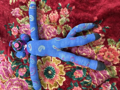 Handmade sock monkey brought