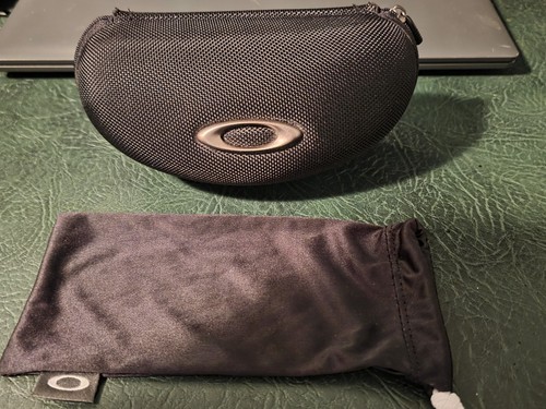 Oakley black hard plastic zip - oakley,