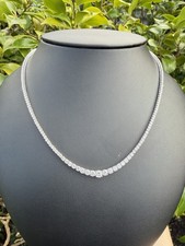 9k White Gold 5.49ct Graduated