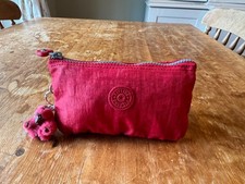 KIPLING RED TEXTILE PURSE CARD