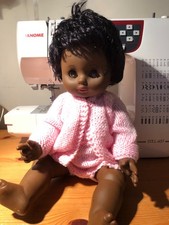 Vintage 1970s Hard Plastic Black Baby Doll – Blinking Eyes & Knitted Cardigan