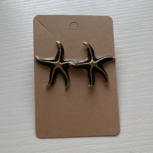 Black gold tone starfish - gold,