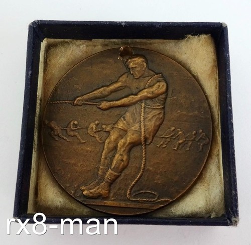 Antique 1923 bronze tug war - antique, of