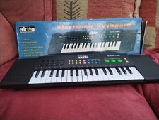 Boxed Akita TY3922 Portable Electronic Keyboard - 37 Key Organ. Battery Operated