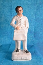 SUPERB LATE 19TH CENTURY STAFFORDSHIRE FIGURE: NEWS SELLER 6AM (SAMSON SMITH)