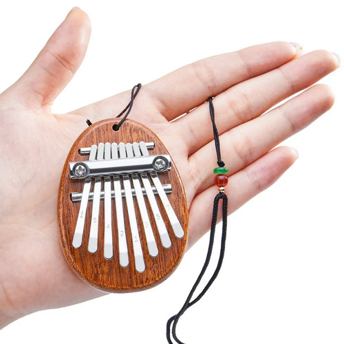 Mini wooden kalimba - wooden, thumb