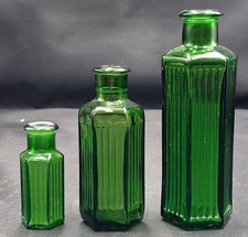 Three green glass - , ribbed