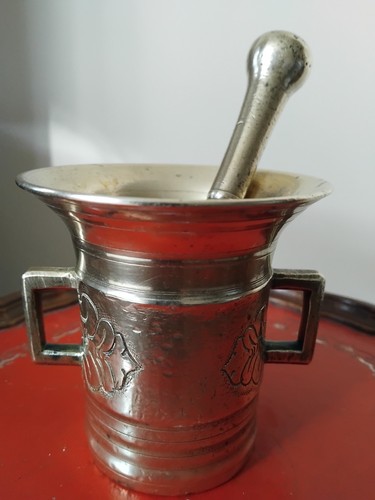 Brass pestle and mortar - and, side