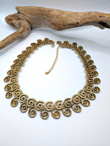 Gold tone spiral disc - gold,