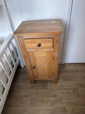 Beside Tall boy Table