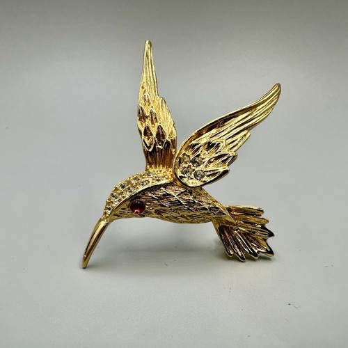 Vintage hummingbird flight - in,