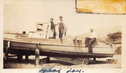 Man woman repairing - repairing, boat