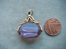 Antique amethyst purple glass ? watch fob - 18ct rolled gold mount
